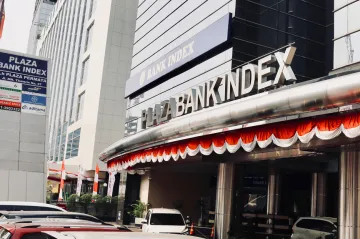 Plaza Bank Index with the new letter signage installed at building canopy